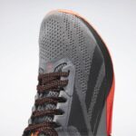 أسود أساسي / رمادي نقي 5 / توهج برتقالي حذاء تدريب نانو x1 للرجال Reebok 0NZ0F1044 - Image 12