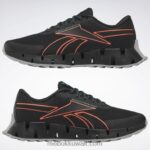 الأساسية أسود / برتقالي مضيئة / البط البري الكلاسيكي حذاء zig dynamica 2 Adventure للرجال Reebok 0NZ0F1105 - Image 9