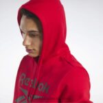 رجال ناقلات الأحمر / الأسود كنزة بغطاء للرأس بشعار الماركة Reebok 0NZ0F1283 - Image 6