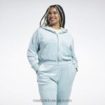 نحيف الرمادي الساحلي كنزة كلاسيك انرجي كيو 4 قطيفة بسحاب (مقاس كبير) Reebok 0NZ0F899