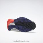 نقي رمادي 3 / الأساسية أسود / برتقالي مضيئة حذاء الجري النسائي floatride Energy 4 Adventure Reebok 0NZ0F324 - Image 7
